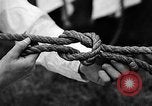 Image of knot tying and flag semaphore Connecticut USA, 1935, second 29 stock footage video 65675049560