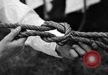 Image of knot tying and flag semaphore Connecticut USA, 1935, second 31 stock footage video 65675049560