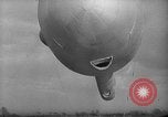 Image of British barrage balloon in Battle of Britain United Kingdom, 1940, second 32 stock footage video 65675049636