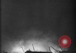Image of building on fire from blitz United Kingdom, 1940, second 1 stock footage video 65675049637