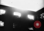 Image of building on fire from blitz United Kingdom, 1940, second 4 stock footage video 65675049637