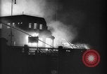 Image of building on fire from blitz United Kingdom, 1940, second 6 stock footage video 65675049637