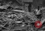 Image of British clearing debris after German blitz United Kingdom, 1940, second 1 stock footage video 65675049638