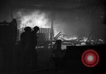 Image of building burns from blitz London England United Kingdom, 1940, second 1 stock footage video 65675049667
