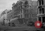 Image of building burns from blitz London England United Kingdom, 1940, second 30 stock footage video 65675049667