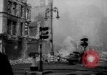 Image of building burns from blitz London England United Kingdom, 1940, second 49 stock footage video 65675049667