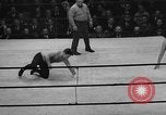 Image of wrestling New York United States USA, 1938, second 46 stock footage video 65675049677