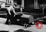 Image of Homemade car of newspaper boy Edward Floyd Seattle Washington USA, 1933, second 23 stock footage video 65675049746