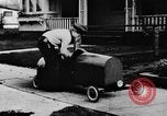 Image of Homemade car of newspaper boy Edward Floyd Seattle Washington USA, 1933, second 25 stock footage video 65675049746