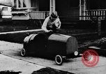 Image of Homemade car of newspaper boy Edward Floyd Seattle Washington USA, 1933, second 26 stock footage video 65675049746