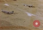 Image of Allied invasion gliders and C-47 tow planes parked France, 1944, second 28 stock footage video 65675049825