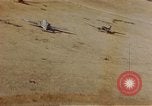 Image of Allied invasion gliders and C-47 tow planes parked France, 1944, second 32 stock footage video 65675049825