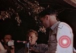 Standbild lt Col Gilbert O Wymond und Fliegern der 65th Fighter Squadron Korsika Frankreich, 1944, aus Sekunde 47 historischem Filmmaterial Videoclip 65675049831