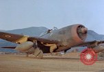 Standbild lt Col Gilbert O Wymond und Fliegern der 65th Fighter Squadron Korsika Frankreich, 1944, aus Sekunde 59 historischem Filmmaterial Videoclip 65675049831