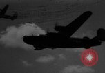 Image of American B-24 Liberator aircraft dropping bombs France, 1944, second 1 stock footage video 65675049848