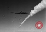 Image of American B-24 Liberator aircraft dropping bombs France, 1944, second 13 stock footage video 65675049848