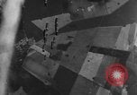 Image of American B-24 Liberator aircraft dropping bombs France, 1944, second 15 stock footage video 65675049848