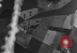 Image of American B-24 Liberator aircraft dropping bombs France, 1944, second 16 stock footage video 65675049848