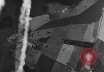 Image of American B-24 Liberator aircraft dropping bombs France, 1944, second 17 stock footage video 65675049848