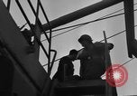 Standbild Landing Craft Infanterie Große offload amerikanischer Truppen in Weymouth England Weymouth England, 1944, aus Sekunde 56 historischem Filmmaterial Videoclip 65675049850