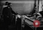 Image of Adolf Hitler visits July 20th bomb plot victims in hospital Rastenburg Germany, 1944, second 8 stock footage video 65675049858