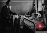 Image of Adolf Hitler visits July 20th bomb plot victims in hospital Rastenburg Germany, 1944, second 9 stock footage video 65675049858