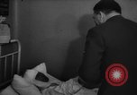 Image of Adolf Hitler visits July 20th bomb plot victims in hospital Rastenburg Germany, 1944, second 21 stock footage video 65675049858
