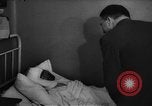 Image of Adolf Hitler visits July 20th bomb plot victims in hospital Rastenburg Germany, 1944, second 23 stock footage video 65675049858