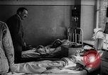 Image of Adolf Hitler visits July 20th bomb plot victims in hospital Rastenburg Germany, 1944, second 25 stock footage video 65675049858