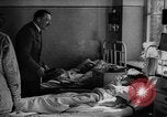 Image of Adolf Hitler visits July 20th bomb plot victims in hospital Rastenburg Germany, 1944, second 28 stock footage video 65675049858