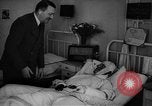 Image of Adolf Hitler visits July 20th bomb plot victims in hospital Rastenburg Germany, 1944, second 30 stock footage video 65675049858