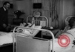 Image of Adolf Hitler visits July 20th bomb plot victims in hospital Rastenburg Germany, 1944, second 36 stock footage video 65675049858