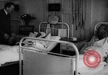 Image of Adolf Hitler visits July 20th bomb plot victims in hospital Rastenburg Germany, 1944, second 38 stock footage video 65675049858
