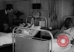 Image of Adolf Hitler visits July 20th bomb plot victims in hospital Rastenburg Germany, 1944, second 41 stock footage video 65675049858