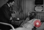 Image of Adolf Hitler visits July 20th bomb plot victims in hospital Rastenburg Germany, 1944, second 43 stock footage video 65675049858