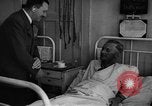 Image of Adolf Hitler visits July 20th bomb plot victims in hospital Rastenburg Germany, 1944, second 44 stock footage video 65675049858