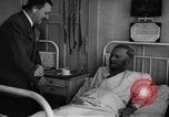 Image of Adolf Hitler visits July 20th bomb plot victims in hospital Rastenburg Germany, 1944, second 45 stock footage video 65675049858