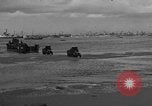 Image of 6x6 Army trucks France, 1944, second 18 stock footage video 65675049897