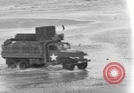 Image of 6x6 Army trucks France, 1944, second 32 stock footage video 65675049897