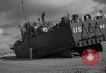 Image of damaged landing craft France, 1944, second 21 stock footage video 65675049900