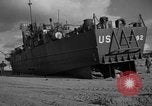Image of damaged landing craft France, 1944, second 31 stock footage video 65675049900