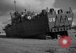 Image of damaged landing craft France, 1944, second 32 stock footage video 65675049900