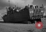 Image of damaged landing craft France, 1944, second 33 stock footage video 65675049900
