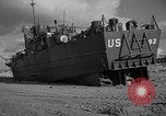 Image of damaged landing craft France, 1944, second 34 stock footage video 65675049900