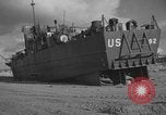 Image of damaged landing craft France, 1944, second 36 stock footage video 65675049900