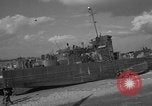 Image of damaged landing craft France, 1944, second 39 stock footage video 65675049900