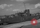 Image of damaged landing craft France, 1944, second 41 stock footage video 65675049900