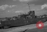 Image of damaged landing craft France, 1944, second 47 stock footage video 65675049900