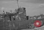 Image of damaged landing craft France, 1944, second 62 stock footage video 65675049900