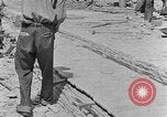 Image of hammering rock slabs Tennessee United States USA, 1940, second 12 stock footage video 65675050026
